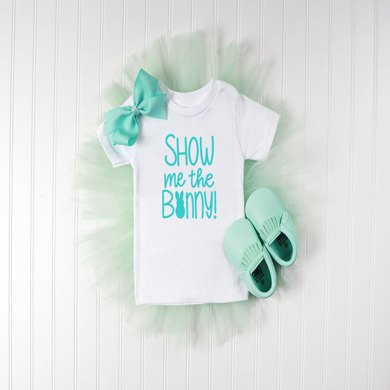 Blue Tutu with Bow and Baby Moccs with White T shirt that has the Show Me the Bunny Design